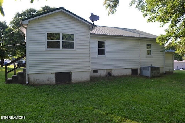 31058 US-127, Pikeville, TN 37367 - rear view of house with a yard, a metal roof, and crawl space