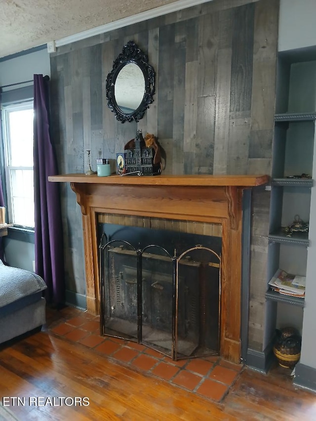955 Poplar St, Alcoa, TN 37701 - detailed view of wood finished floors and a fireplace
