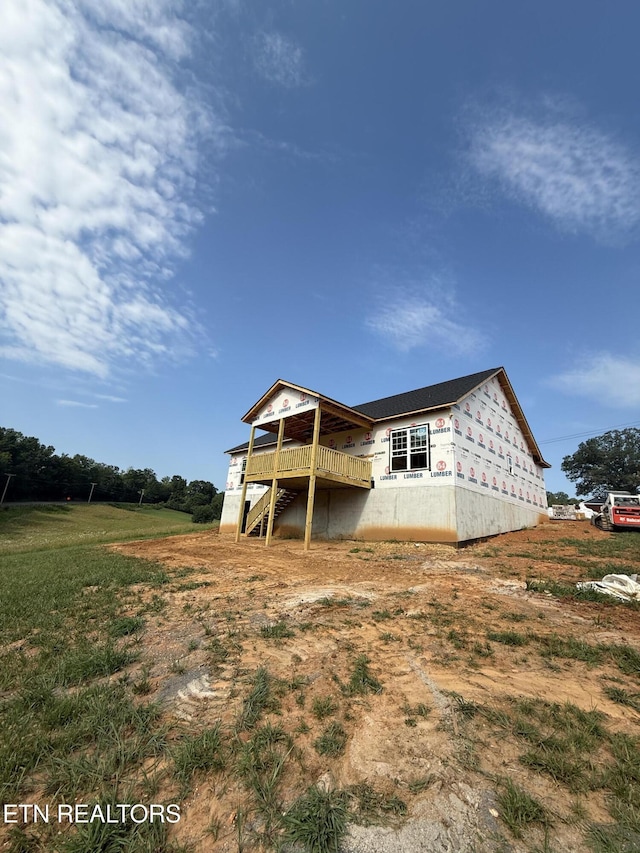 153 Washita Ln, Rutledge, TN 37861 - back of property with a wooden deck and stairs