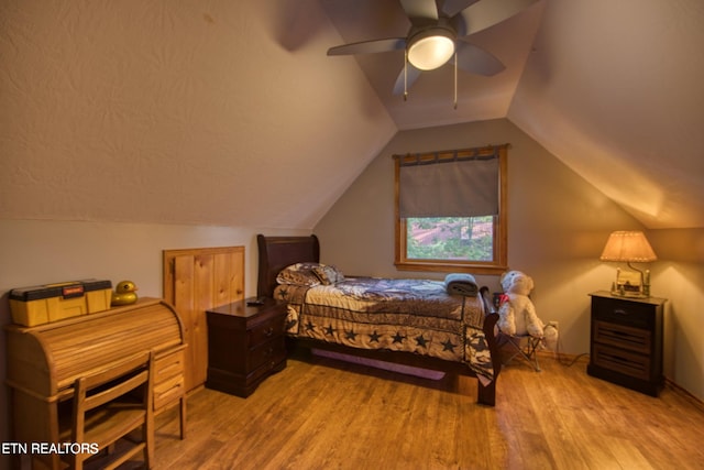 224 Eagle Blf, Jamestown, TN 38556 - bedroom with wood finished floors, vaulted ceiling, and ceiling fan