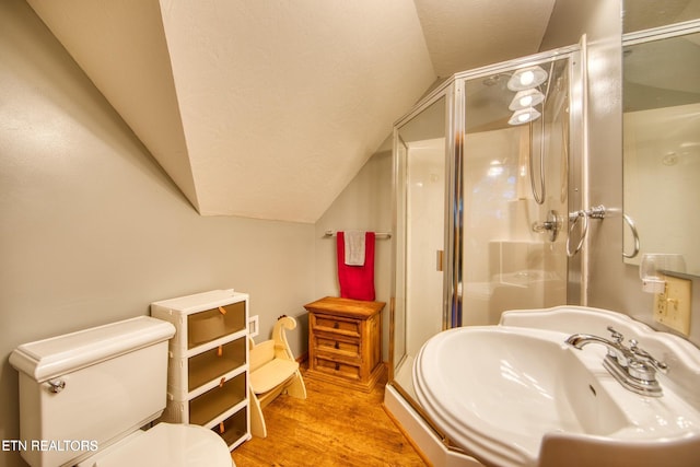 224 Eagle Blf, Jamestown, TN 38556 - full bathroom with vaulted ceiling, a stall shower, and wood finished floors