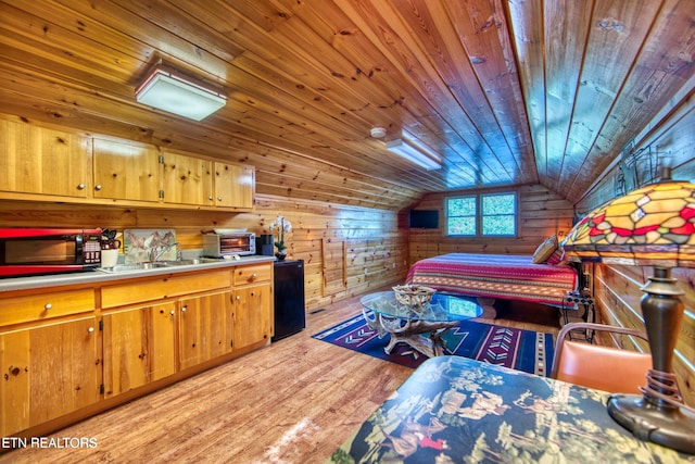 224 Eagle Blf, Jamestown, TN 38556 - bedroom with wooden walls, light wood-style floors, lofted ceiling, wood ceiling, and refrigerator