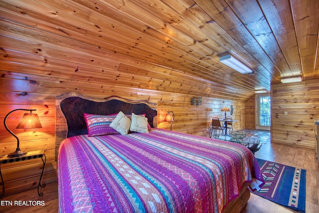 224 Eagle Blf, Jamestown, TN 38556 - bedroom with wood ceiling, wood walls, hardwood / wood-style floors, and lofted ceiling