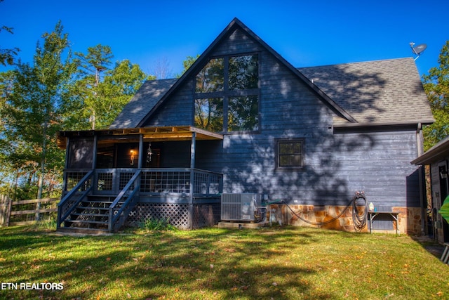 224 Eagle Blf, Jamestown, TN 38556 - back of house with a sunroom, roof with shingles, a deck, and stairs