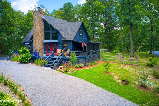 224 Eagle Blf, Jamestown, TN 38556 - rustic home with a shingled roof and a chimney