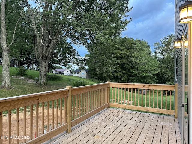 901 Kyle St, Lafollette, TN 37766 - wooden terrace featuring a lawn