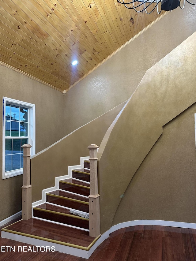 901 Kyle St, Lafollette, TN 37766 - stairs with wooden ceiling, wood finished floors, a chandelier, and crown molding
