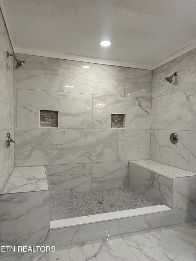 901 Kyle St, Lafollette, TN 37766 - full bath with marble finish floors, a textured ceiling, and a marble finish shower