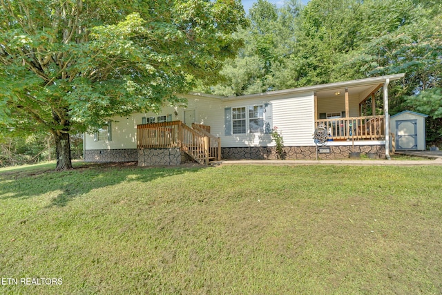 225 N Chuckey Ruritan Rd, Chuckey, TN 37641 - manufactured / mobile home featuring a front yard, a shed, and a porch