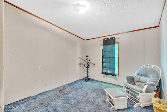 225 N Chuckey Ruritan Rd, Chuckey, TN 37641 - living area with carpet flooring, a textured ceiling, and crown molding