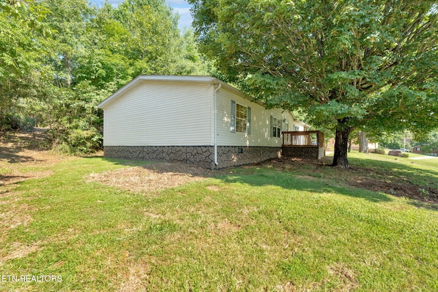 225 N Chuckey Ruritan Rd, Chuckey, TN 37641 - view of property exterior featuring a yard, a deck, and crawl space