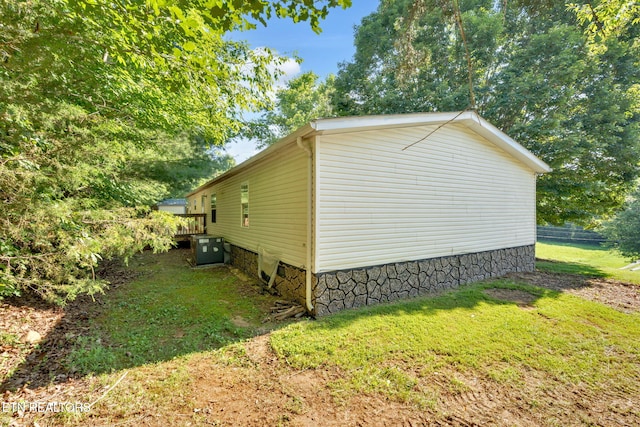 225 N Chuckey Ruritan Rd, Chuckey, TN 37641 - view of property exterior featuring a central AC unit and a yard