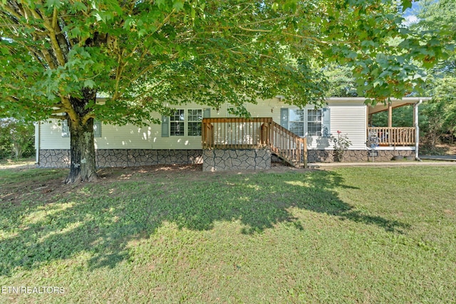 225 N Chuckey Ruritan Rd, Chuckey, TN 37641 - view of front of house with a front lawn and a deck