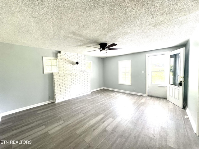 914 S 13th St, Lafollette, TN 37766 - unfurnished room with a ceiling fan, wood finished floors, and a textured ceiling