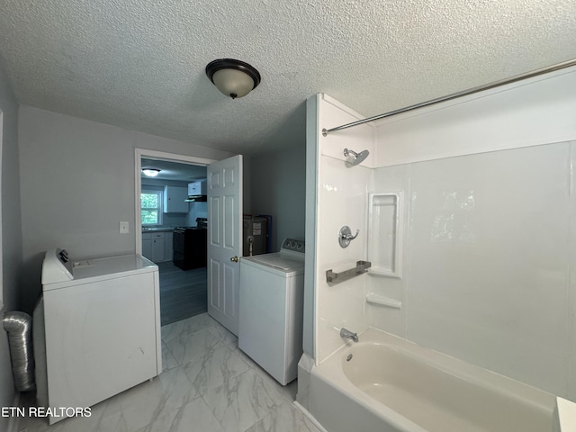 914 S 13th St, Lafollette, TN 37766 - full bathroom with washer / dryer, marble finish floors, shower / bathtub combination, and a textured ceiling