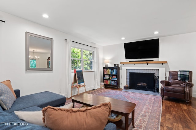 1521 Aldenwood Ln, Knoxville, TN 37919 - living room with wood finished floors, a fireplace, recessed lighting, and a chandelier