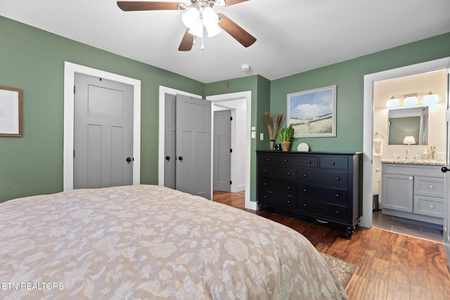 1521 Aldenwood Ln, Knoxville, TN 37919 - bedroom featuring wood finished floors, connected bathroom, and a ceiling fan