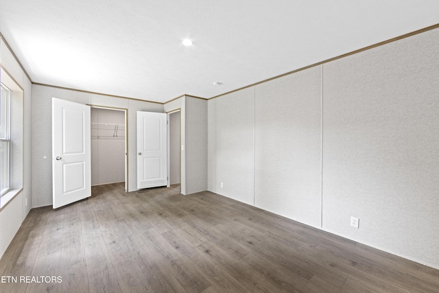 417 Cain Ave, Morristown, TN 37813 - unfurnished bedroom featuring wood finished floors and a closet