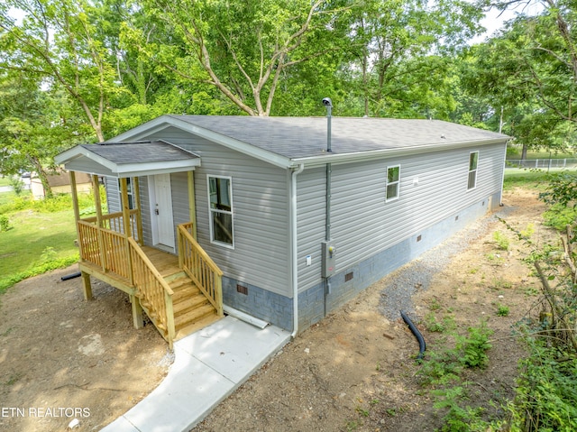 417 Cain Ave, Morristown, TN 37813 - view of front of property with crawl space, a shingled roof, and view of scattered trees