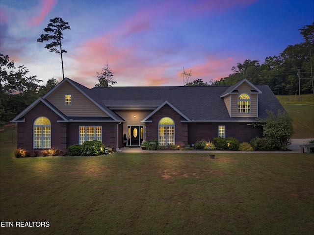 5728 Hickory Valley Rd, Heiskell, TN 37754 - traditional home featuring a yard, roof with shingles, and brick siding