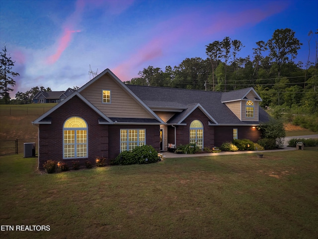 5728 Hickory Valley Rd, Heiskell, TN 37754 - traditional-style house featuring a front lawn, brick siding, and roof with shingles