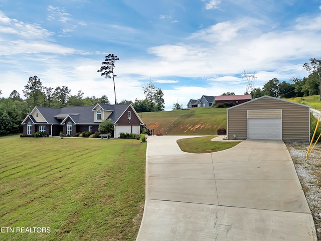 5728 Hickory Valley Rd, Heiskell, TN 37754 - view of front facade featuring a garage, driveway, and an outdoor structure
