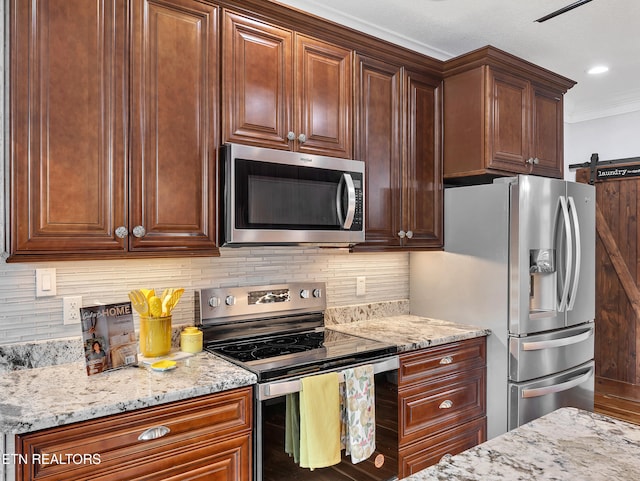 5728 Hickory Valley Rd, Heiskell, TN 37754 - kitchen with appliances with stainless steel finishes, backsplash, light stone countertops, ornamental molding, and recessed lighting