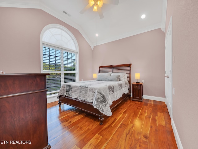 5728 Hickory Valley Rd, Heiskell, TN 37754 - bedroom featuring vaulted ceiling, crown molding, wood finished floors, and a ceiling fan