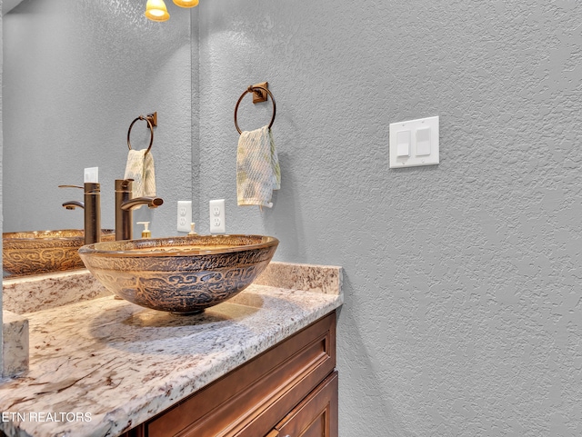 5728 Hickory Valley Rd, Heiskell, TN 37754 - bathroom featuring vanity and a textured wall