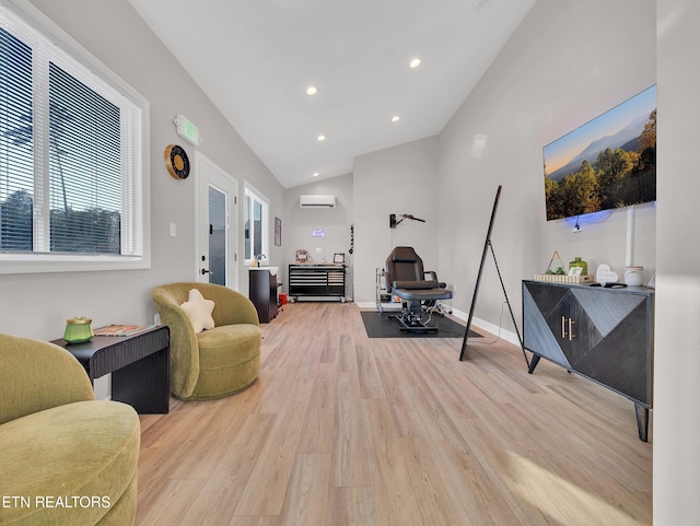 5728 Hickory Valley Rd, Heiskell, TN 37754 - exercise area with a wall mounted air conditioner, light wood-style flooring, lofted ceiling, and recessed lighting