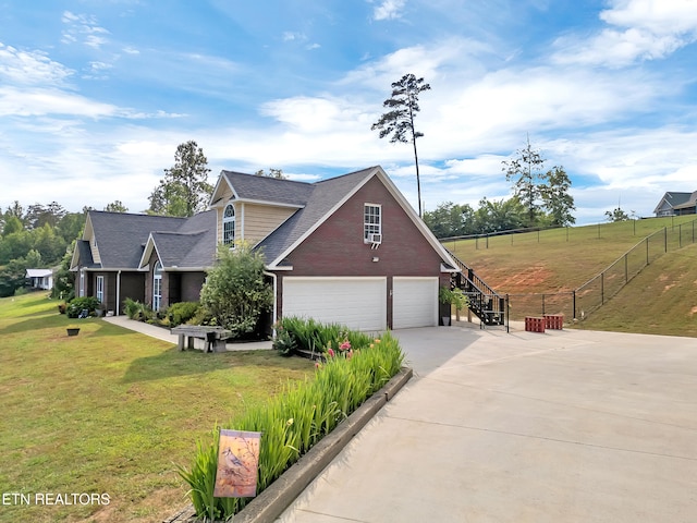 5728 Hickory Valley Rd, Heiskell, TN 37754 - view of home's exterior with driveway, brick siding, a garage, roof with shingles, and stairway