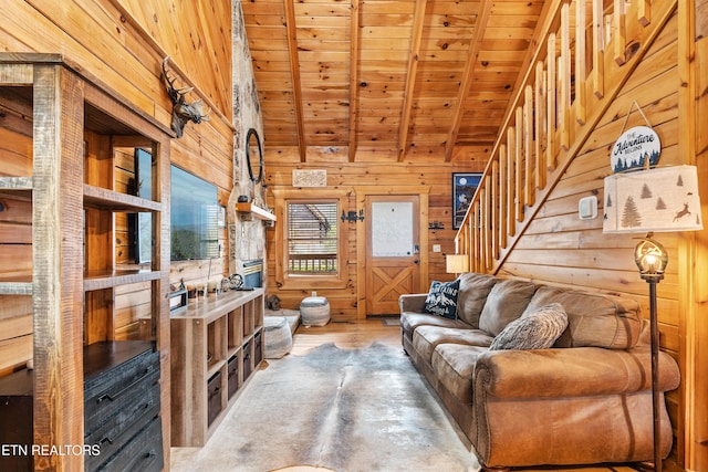 524 Hoot Owl Way, Gatlinburg, TN 37738 - living area with wood walls, wooden ceiling, stairs, and wood finished floors