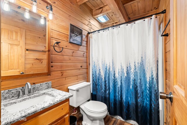 524 Hoot Owl Way, Gatlinburg, TN 37738 - full bathroom with vanity, wood walls, wooden ceiling, a shower with curtain, and wood finished floors