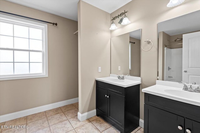 168 Thelma Cir, Jacksboro, TN 37757 - full bath with two vanities, a shower, and tile patterned floors
