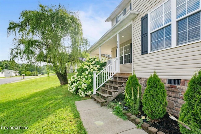 168 Thelma Cir, Jacksboro, TN 37757 - entrance to property featuring a lawn and a porch