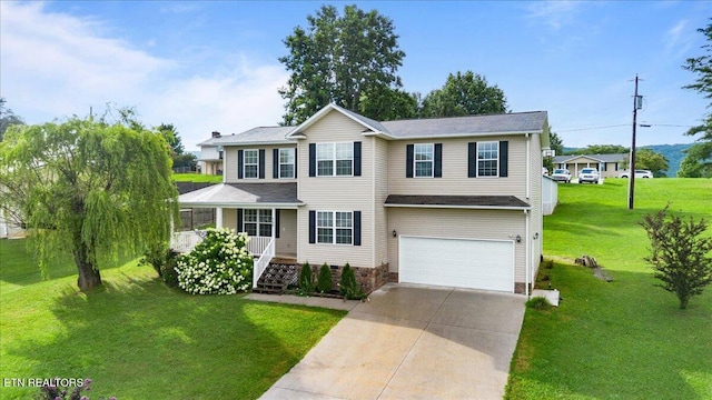 168 Thelma Cir, Jacksboro, TN 37757 - view of front of house with a garage, concrete driveway, a front lawn, covered porch, and a shingled roof