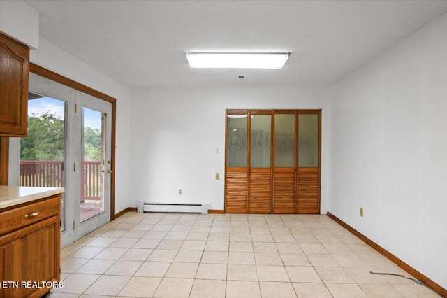 261 Lance Ln, Lafollette, TN 37766 - empty room with a baseboard radiator and baseboards