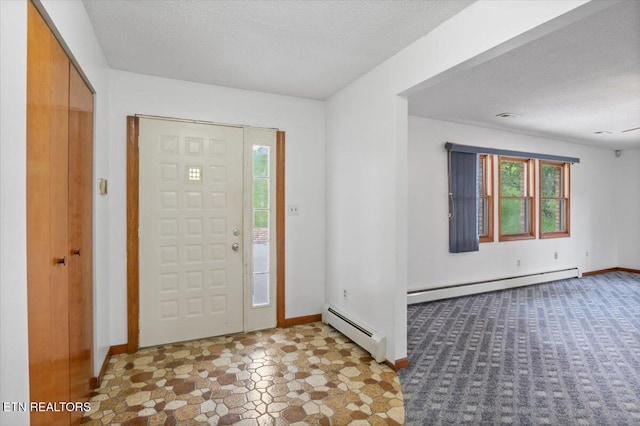 261 Lance Ln, Lafollette, TN 37766 - foyer featuring a baseboard heating unit, plenty of natural light, and a textured ceiling