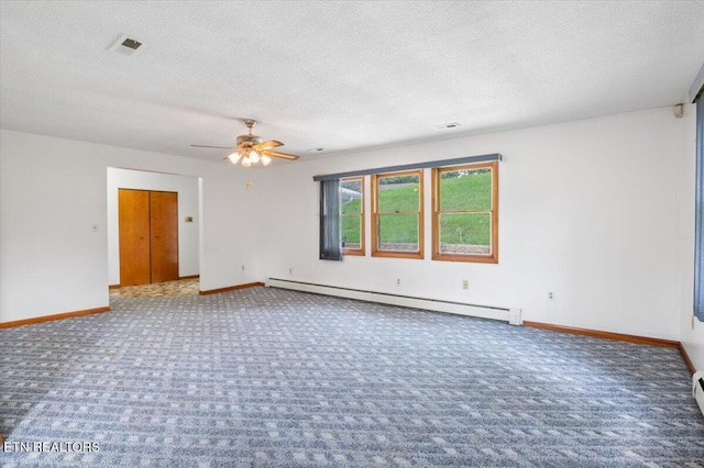 261 Lance Ln, Lafollette, TN 37766 - spare room featuring baseboard heating, carpet flooring, ceiling fan, and a textured ceiling