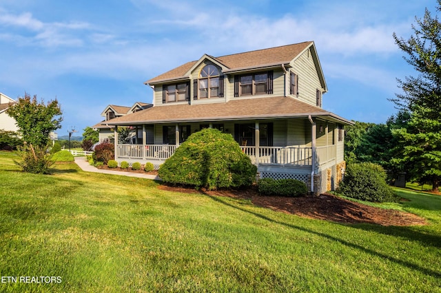 3938 Settlers Trl, Kodak, TN 37764 - farmhouse inspired home featuring a porch, a front lawn, and roof with shingles