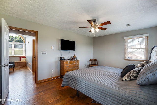 3938 Settlers Trl, Kodak, TN 37764 - bedroom with wood finished floors, a textured ceiling, and ceiling fan
