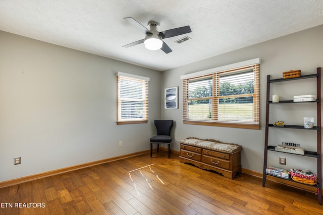 3938 Settlers Trl, Kodak, TN 37764 - sitting room with ceiling fan, wood finished floors, and a textured ceiling
