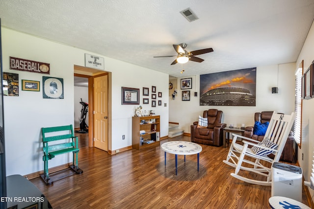 3938 Settlers Trl, Kodak, TN 37764 - living room featuring a ceiling fan, wood finished floors, and a textured ceiling