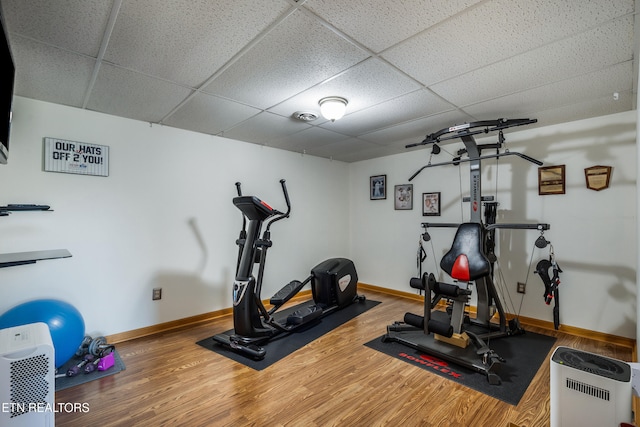 3938 Settlers Trl, Kodak, TN 37764 - exercise room with a drop ceiling and wood finished floors