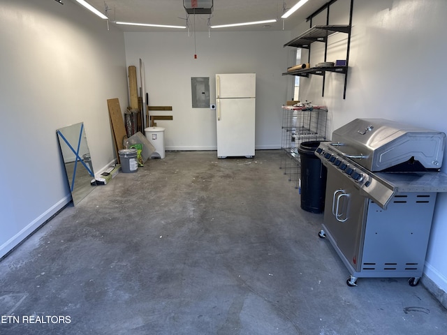 1884 Elmhurst Way, Knoxville, TN 37923 - garage featuring freestanding refrigerator, electric panel, and a garage door opener