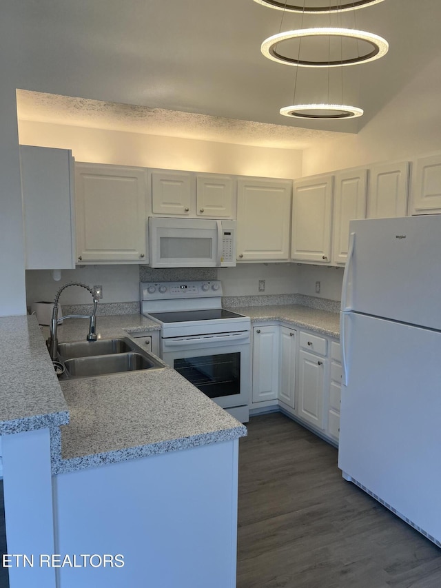 1884 Elmhurst Way, Knoxville, TN 37923 - kitchen featuring white appliances, white cabinets, light countertops, and dark wood finished floors