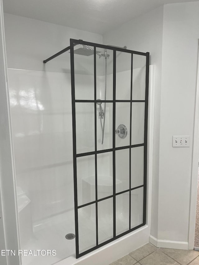 1884 Elmhurst Way, Knoxville, TN 37923 - bathroom featuring a stall shower and tile patterned floors
