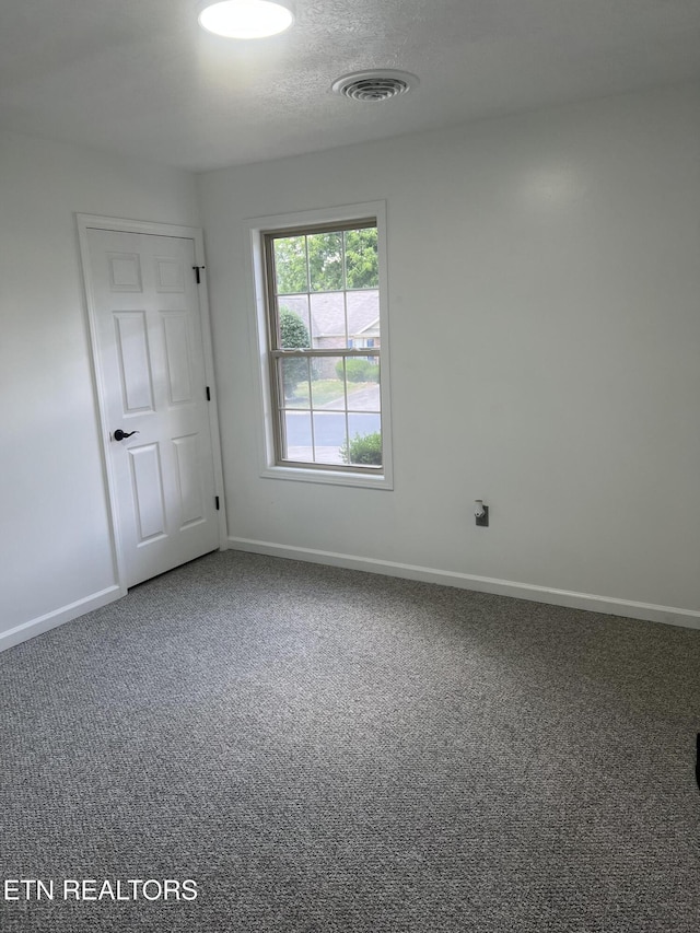1884 Elmhurst Way, Knoxville, TN 37923 - empty room featuring carpet and a textured ceiling