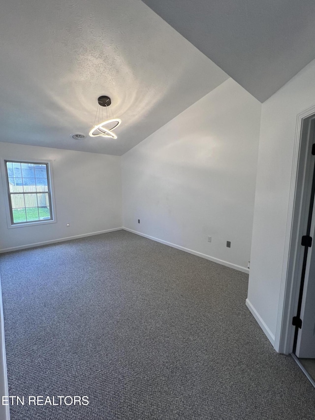 1884 Elmhurst Way, Knoxville, TN 37923 - spare room featuring dark carpet and a textured ceiling