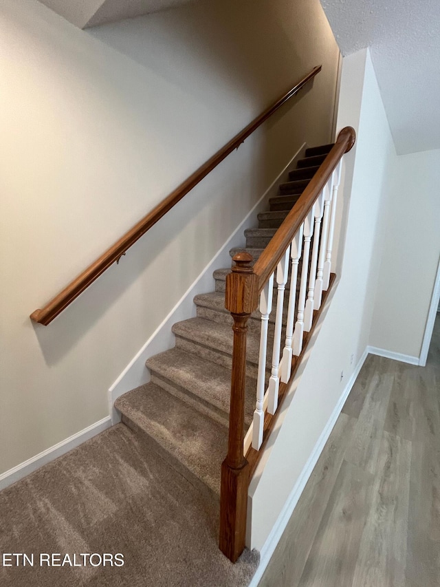 4709 Scepter Way, Knoxville, TN 37912 - stairway featuring baseboards and wood finished floors